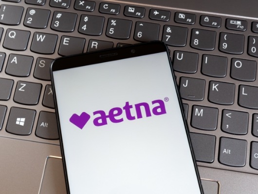 Aetna logo on smartphone