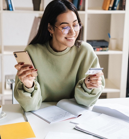 Woman using a credit card