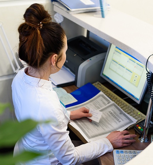 Receptionist at a desk