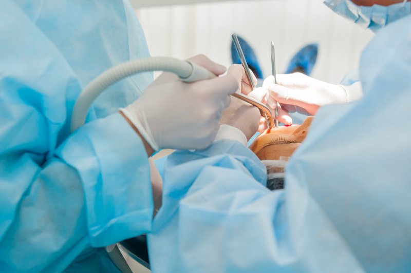 person undergoing dental implant surgery